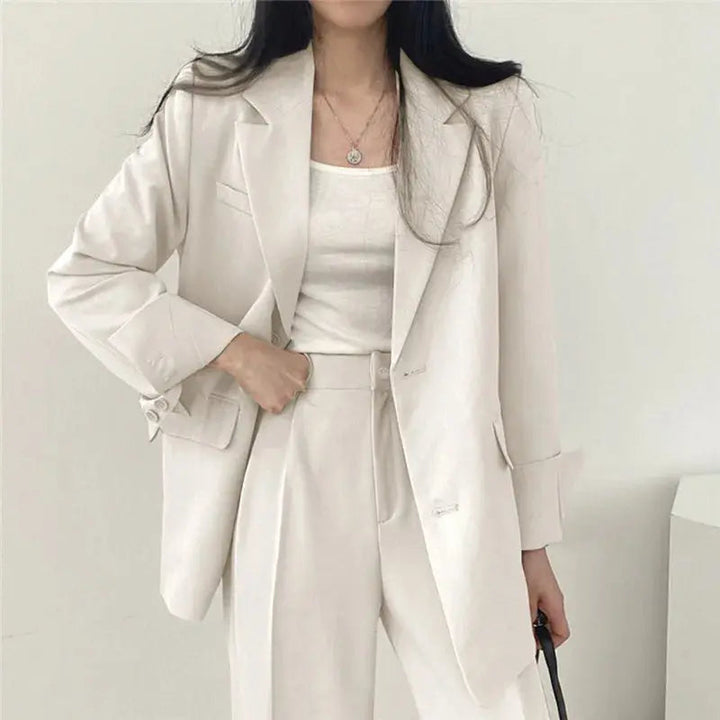 Elegant women's tailored suit for a sharp and modern professional look.