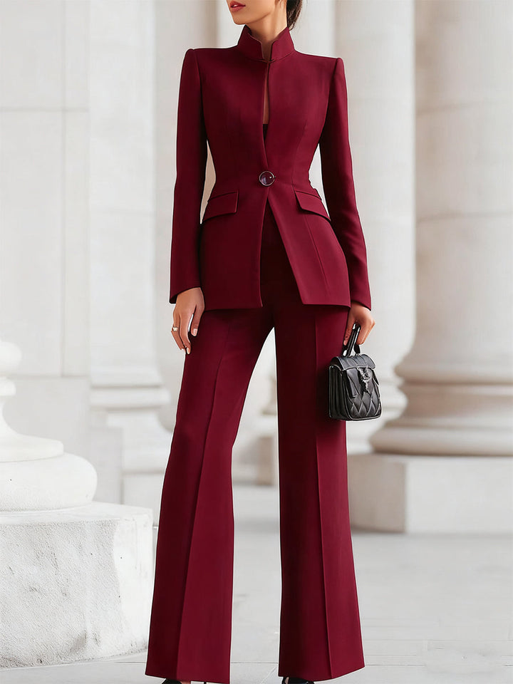 Full length view of a women's elegant blazer and trousers matching set, offering professional and versatile business attire.