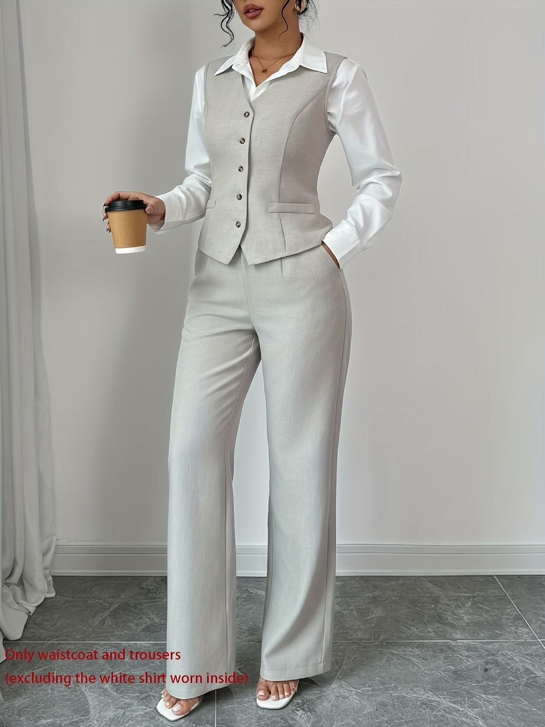 Women's elegant tailored high-waist trousers & single-breasted vest set. Perfect professional business attire.