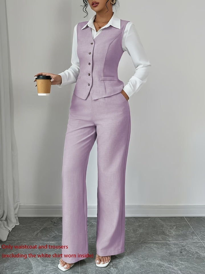Chic women's matching vest and high-waist trousers set. Versatile tailored outfit for professional or event wear.