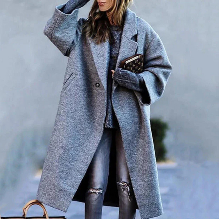 Chic women's tailored blazer in a versatile design, great for layered fashion.