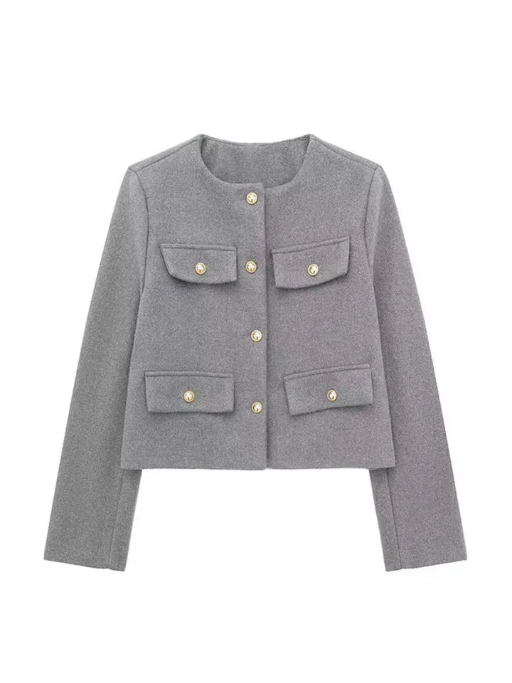 Sophisticated women's button-up cropped jacket with rich texture. Ideal for elegant fall fashion.