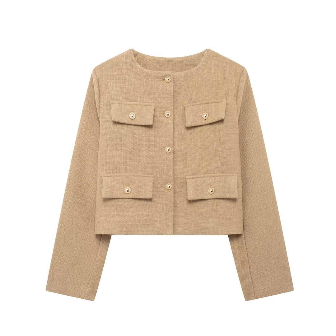 Women's chic textured cropped jacket. Button-up, elegant, and versatile for spring or fall layering.