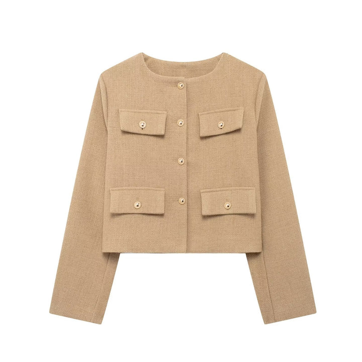 Women's chic textured cropped jacket. Button-up, elegant, and versatile for spring or fall layering.