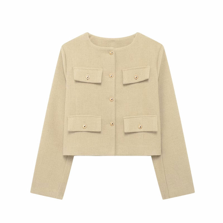 Elegant women's button-up cropped jacket in a unique textured fabric. Perfect modern outerwear.