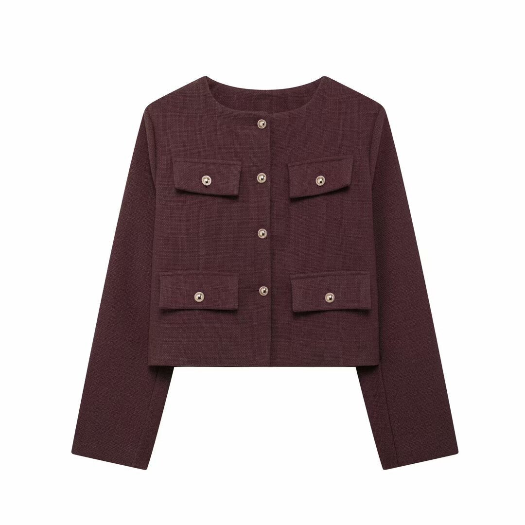 Women's modern cropped blazer. Textured, button-up, round neck, ideal for elegant spring/fall fashion.