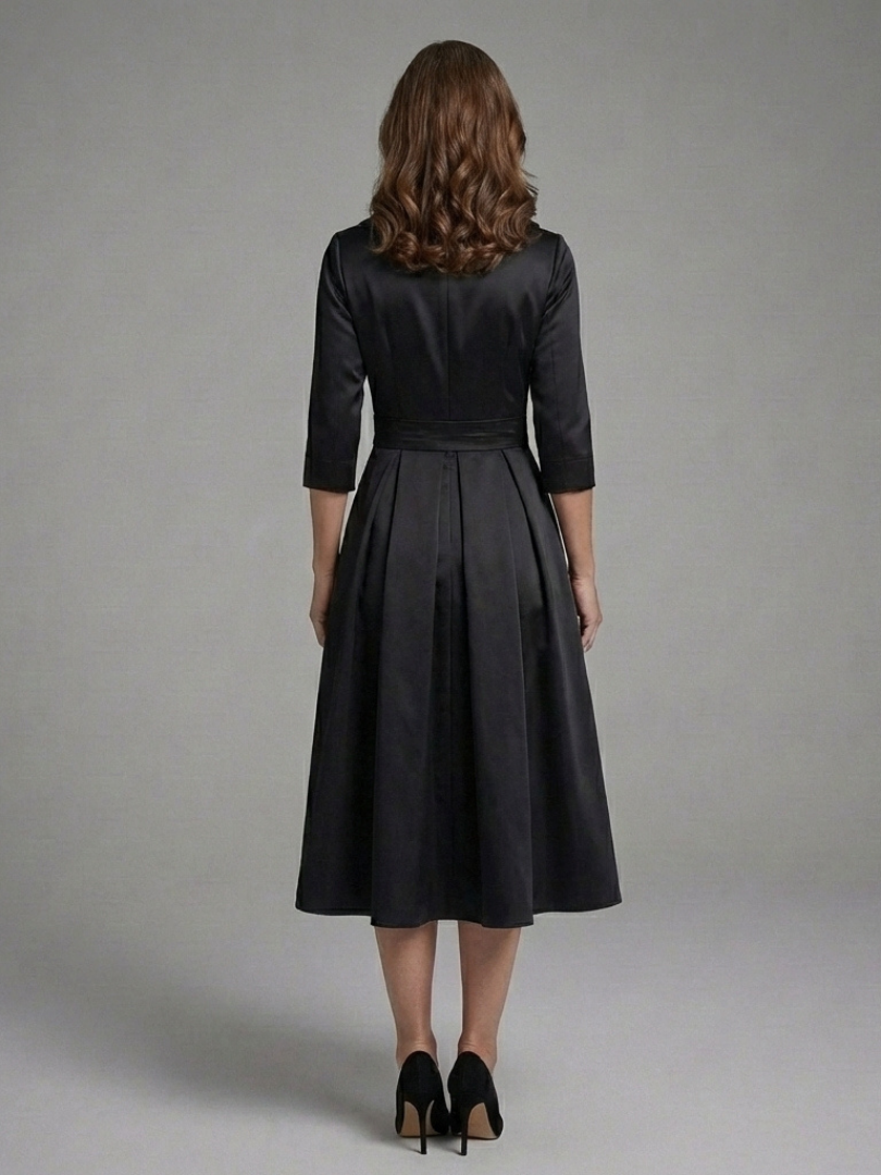 Sophisticated women's wrap midi cocktail dress featuring three-quarter sleeves, suitable for workwear.