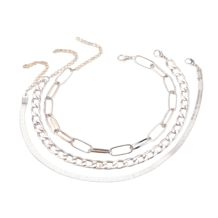 Simple yet elegant women's twisted chain bracelet, featuring intertwined silver and gold tones.