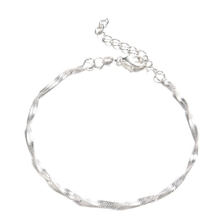 Elegant twisted silver & gold tone chain bracelet for women, a perfect gift or fashion accessory.