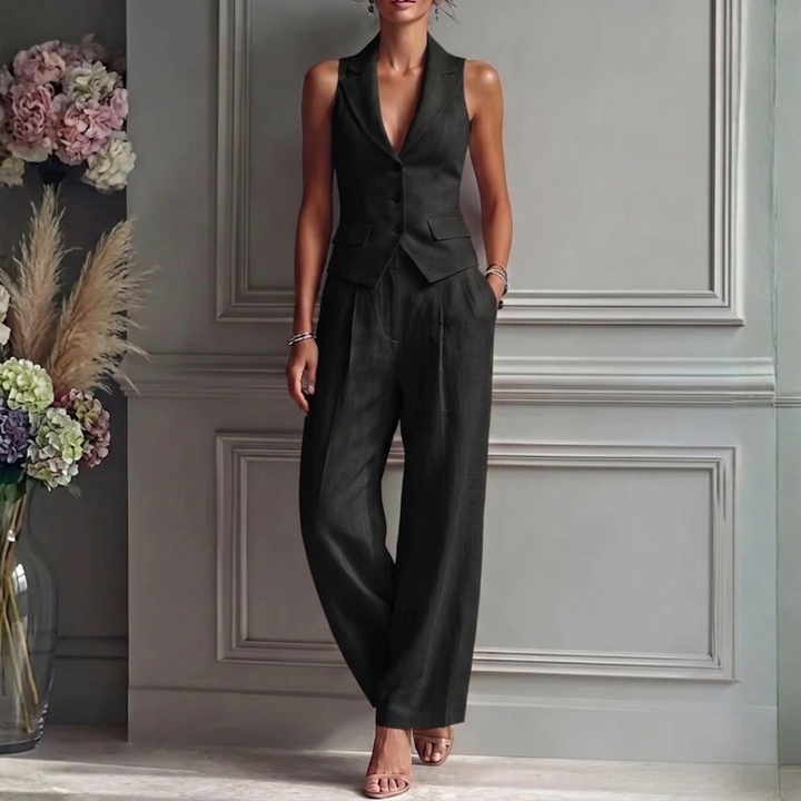 Modern women's fashion two-piece set: a sleek sleeveless vest & high-waist wide-leg pants. Smart & versatile.