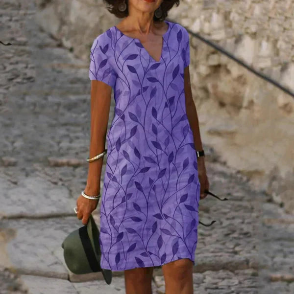 Stylish V-neck A-line casual summer midi dress for women, offering an elegant and breezy look.