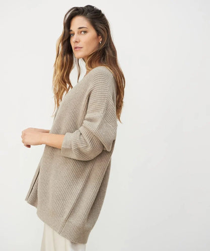 Soft knit V-neck cardigan for women, comfortable and elegant daily wear.