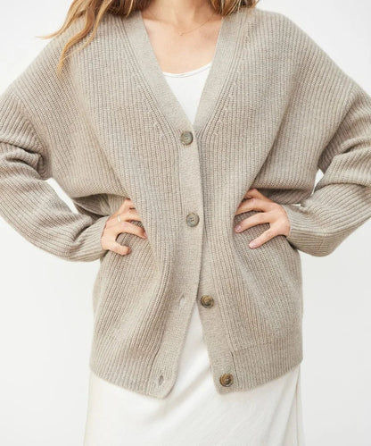 Elegant women's V-neck cardigan sweater, long sleeve for versatile winter styling.