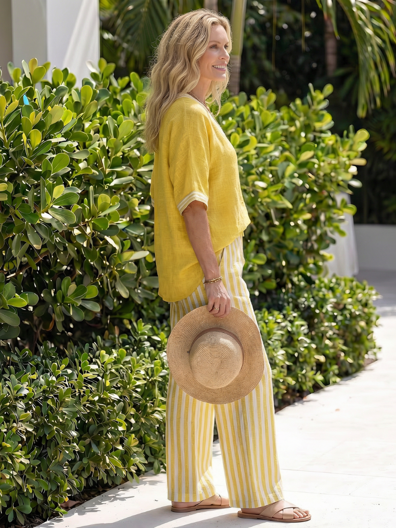Elegant V-neck tunic & striped wide-leg trousers, women's relaxed fit summer outfit.