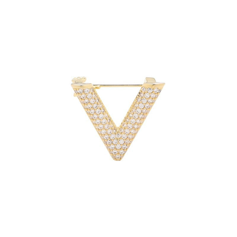 Silver-tone V-shaped crystal pin, an elegant women's accessory for dresses and blazers.