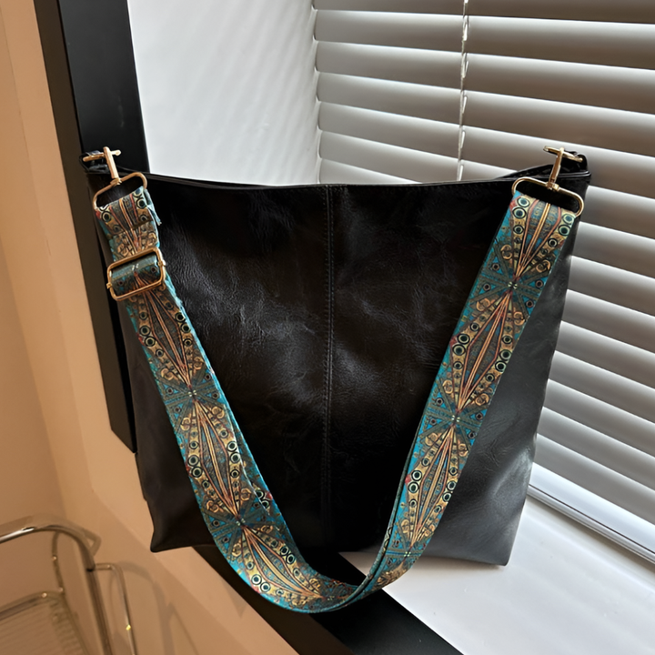 Women's elegant vintage handbag, made from soft suede leather, perfect for everyday style.