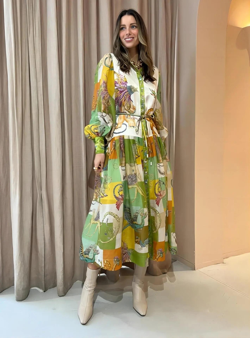 Elegant women's maxi dress featuring a timeless vintage print & sophisticated polo collar.