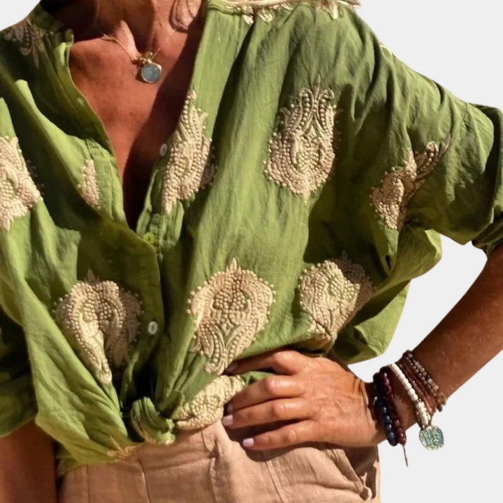 Chic women's blue everyday top, a modern & comfortable versatile shirt for casual or elegant spring/summer style.