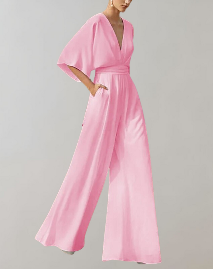 Stylish women's wide leg V-neck jumpsuit with batwing sleeves, ideal for comfortable formal wear.