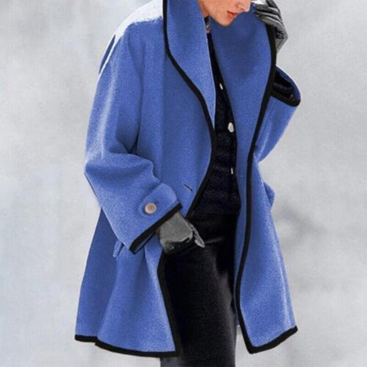 Stylish women's warm winter trench coat with double buttons. Perfect outerwear for a chic look.