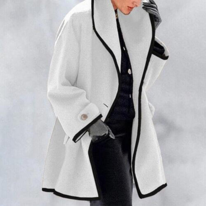 Stylish women's winter jacket with double-button trench design. Perfect for fashion & warmth.