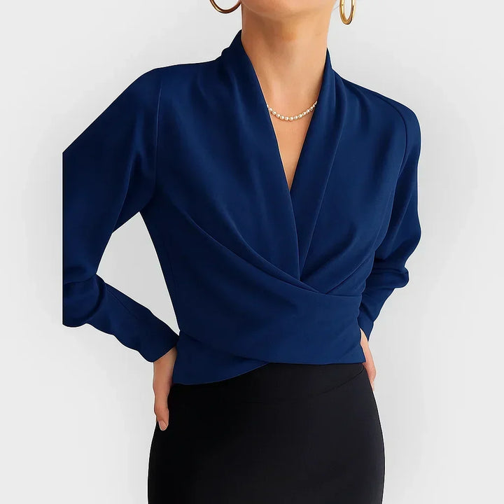 Women's elegant wrap blouse, perfect for office or leisure. Versatile long sleeve top in a chic, sophisticated style.