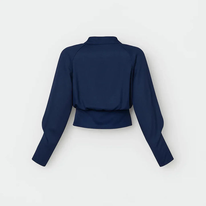 Modern women's wrap blouse with long sleeves. Elegant and sophisticated, ideal for stylish office or casual fashion.