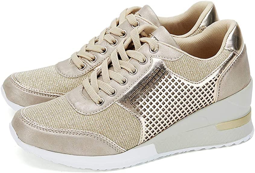 Stylish women's wedge sneakers, grey, with a comfortable elevated sole. Perfect fashion sneakers for casual outfits.