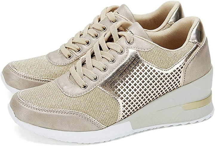 Stylish women's wedge sneakers, grey, with a comfortable elevated sole. Perfect fashion sneakers for casual outfits.