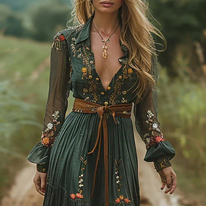 Long bohemian embroidered V-neck maxi dress with sheer sleeves, ideal for special occasions & evening wear.