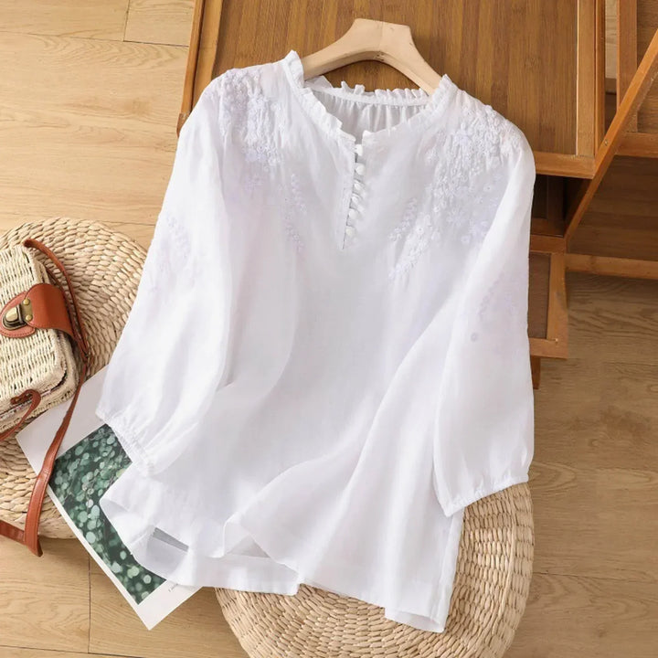 Women's embroidered boho tunic blouse with button front, long sleeves, perfect for summer fashion.