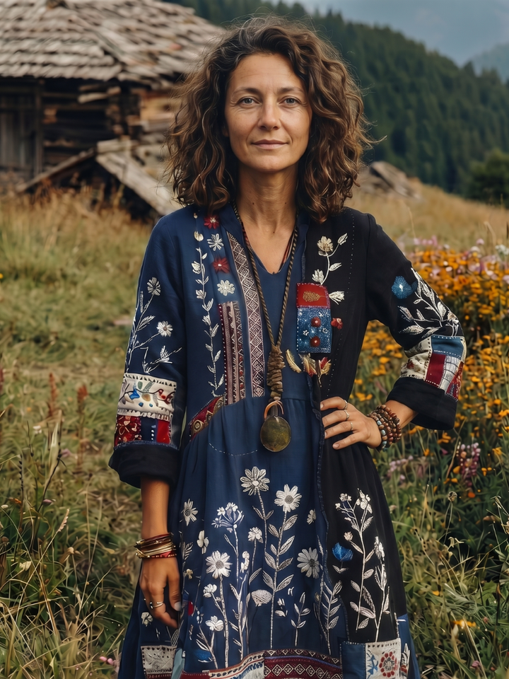 Elegant women's long sleeve midi dress, intricate embroidery & unique panel design for casual wear.