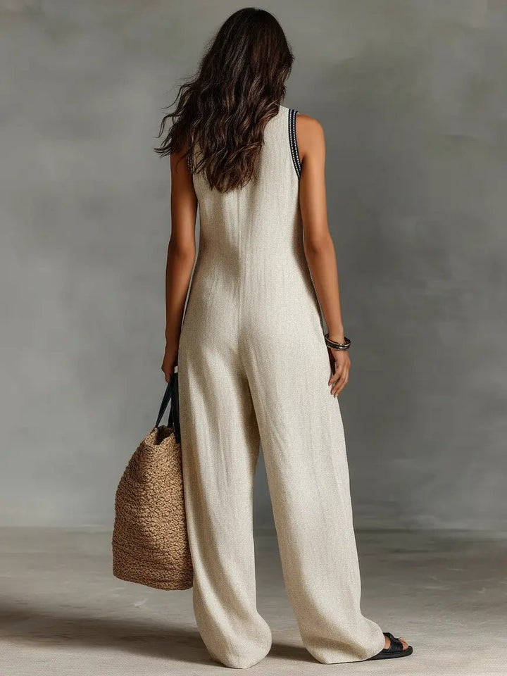 Versatile women's sleeveless wide-leg jumpsuit, embroidered, ideal for workwear or modern events.