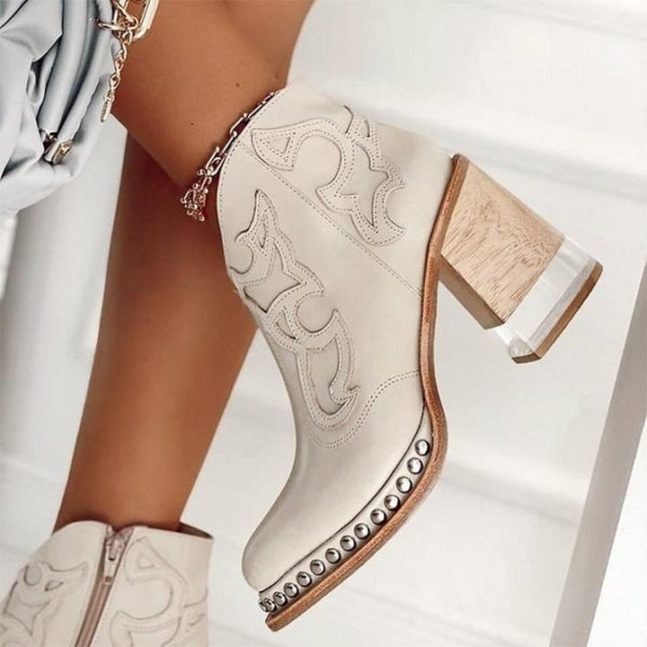 Blue women's embroidered western ankle boots with elegant design & comfortable block heel. Versatile fashion.