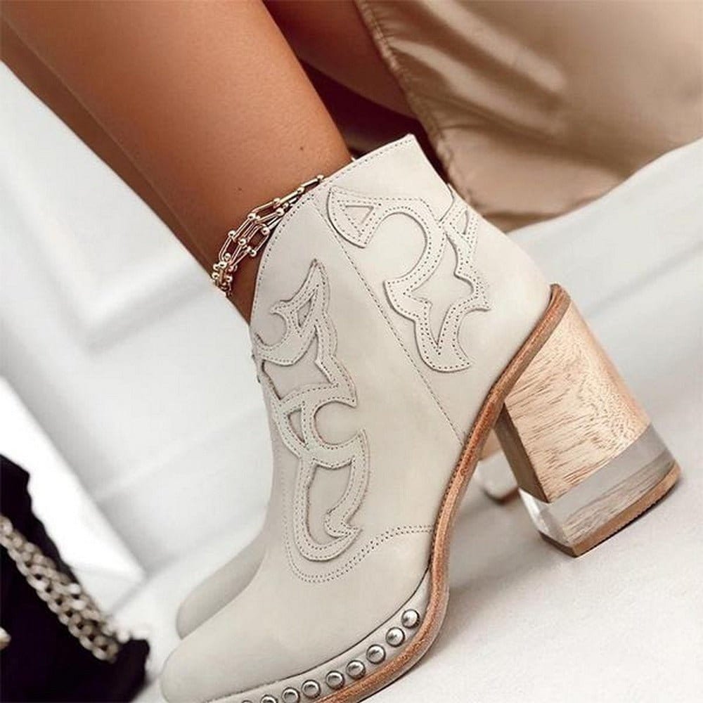 Fashionable women's embroidered western ankle boots with a chic block heel, available in multiple colors.