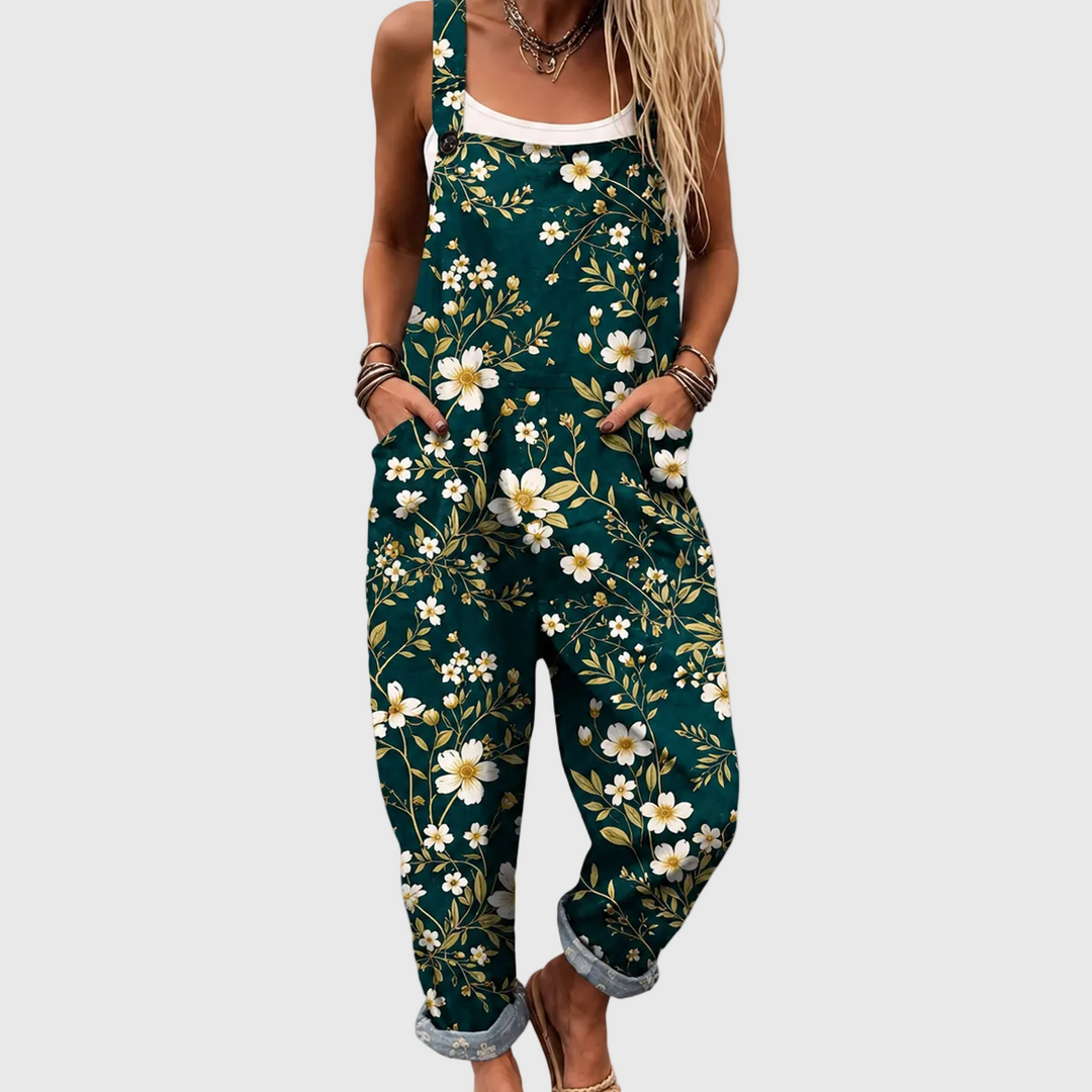 Women's emerald floral jumpsuit for summer vacation. Comfortable and stylish ladies green floral jumpsuit.