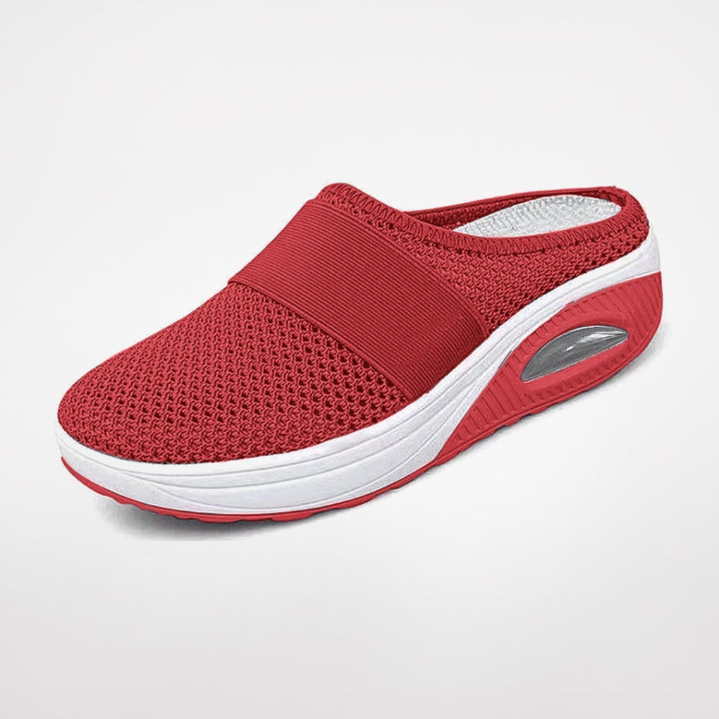 Women's ergonomic comfort slippers in black, designed for everyday walking & superior support.