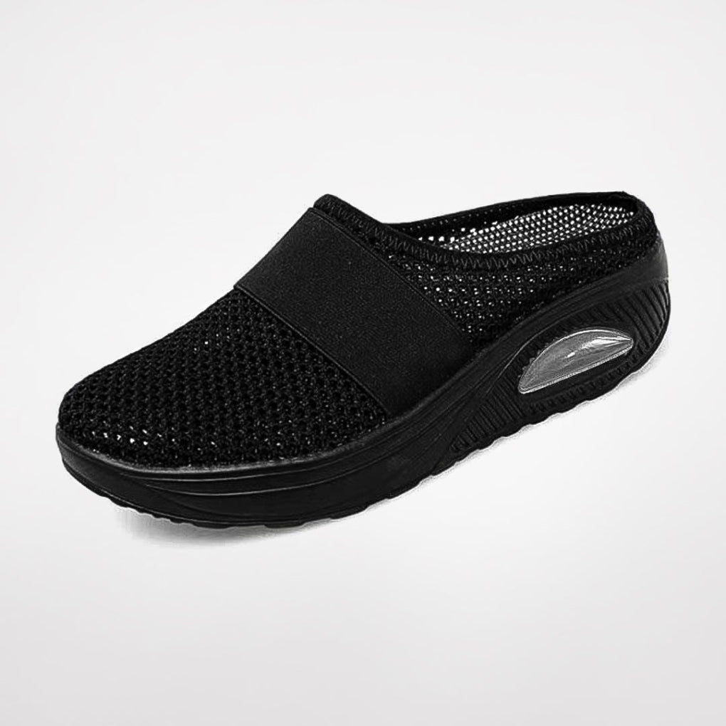 Grey women's comfort slippers with ergonomic design, offering excellent support for daily walking.