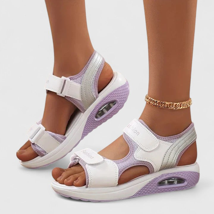 Supportive women's wide-fit orthopedic sandals, offering superior foot support and cushioning for pain relief.