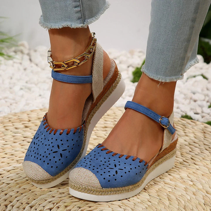Women's espadrille wedge sandals with ankle strap, perfect for elegant summer comfort.