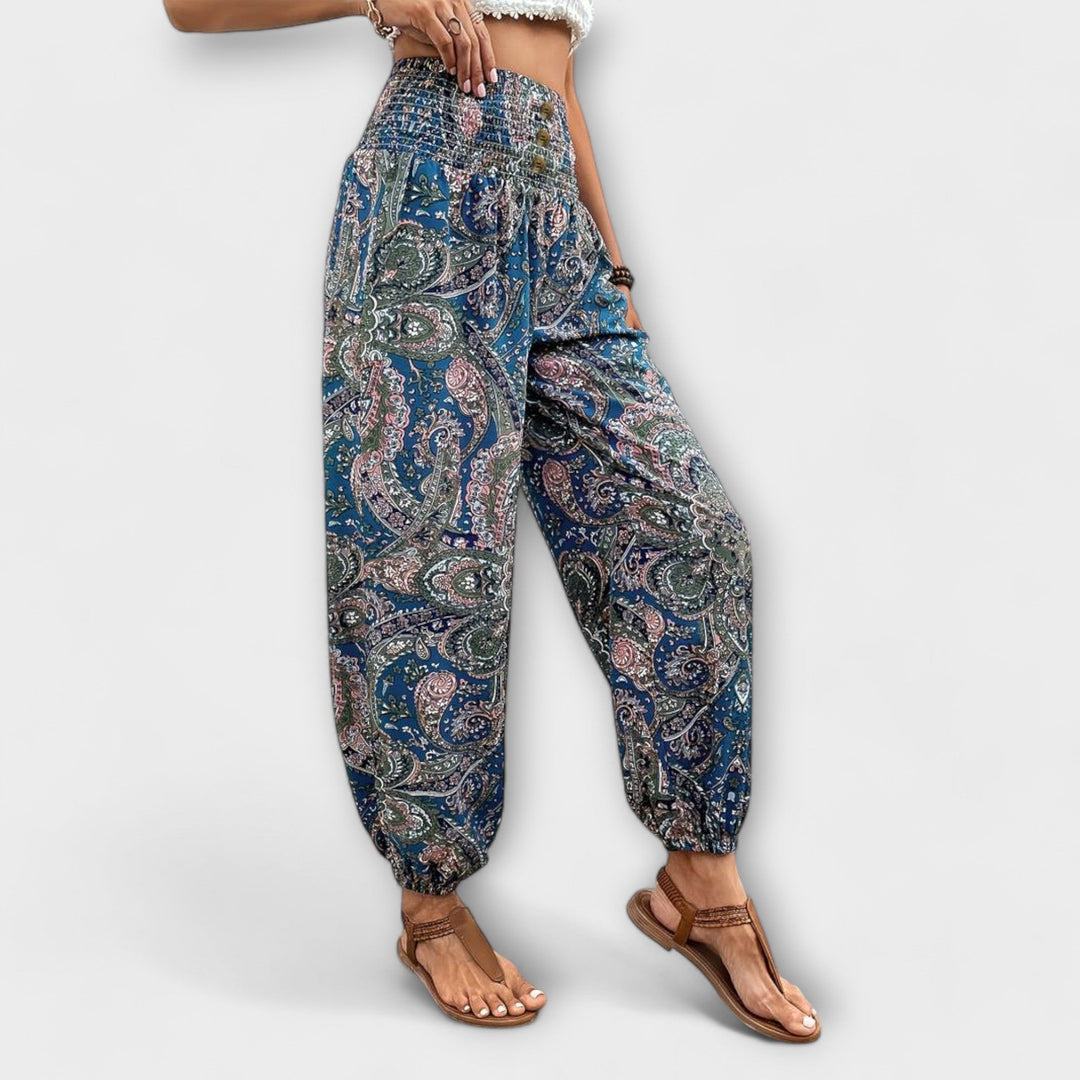 Side view of women's comfortable ethnic graphic trousers, highlighting their flattering cut.