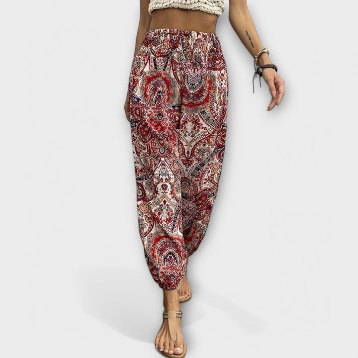 Elegant women's graphic pants in an ethnic design, combining comfort with a fashionable edge.