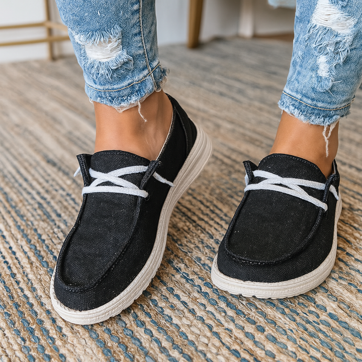 Minimalist women's flats with lace-up design, offering everyday comfort for casual walking.