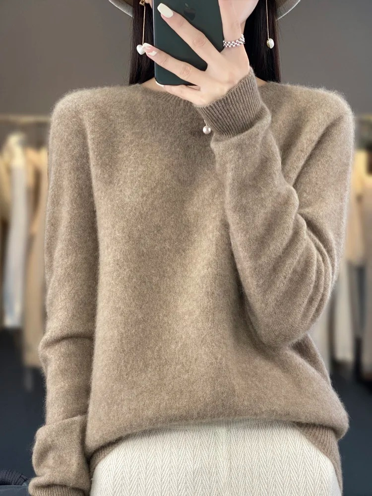 Women's Everyday Elegance Round Neck Sweater, a comfortable and versatile long sleeve top for all seasons.