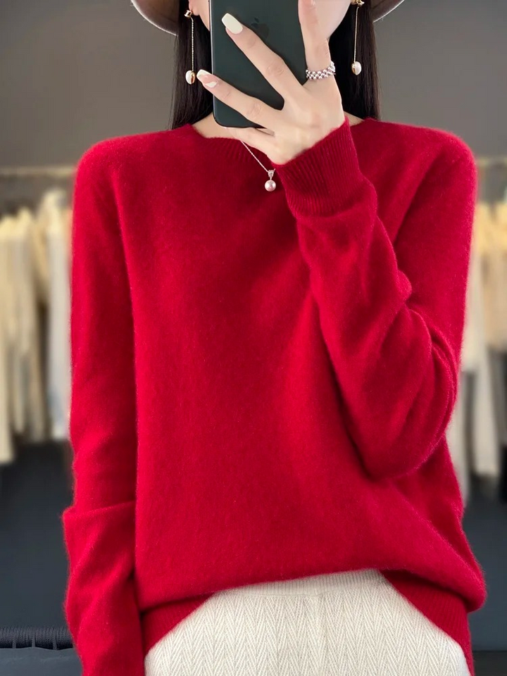 Quality women's round neck sweater, an elegant and comfortable long sleeve top for versatile everyday wear.