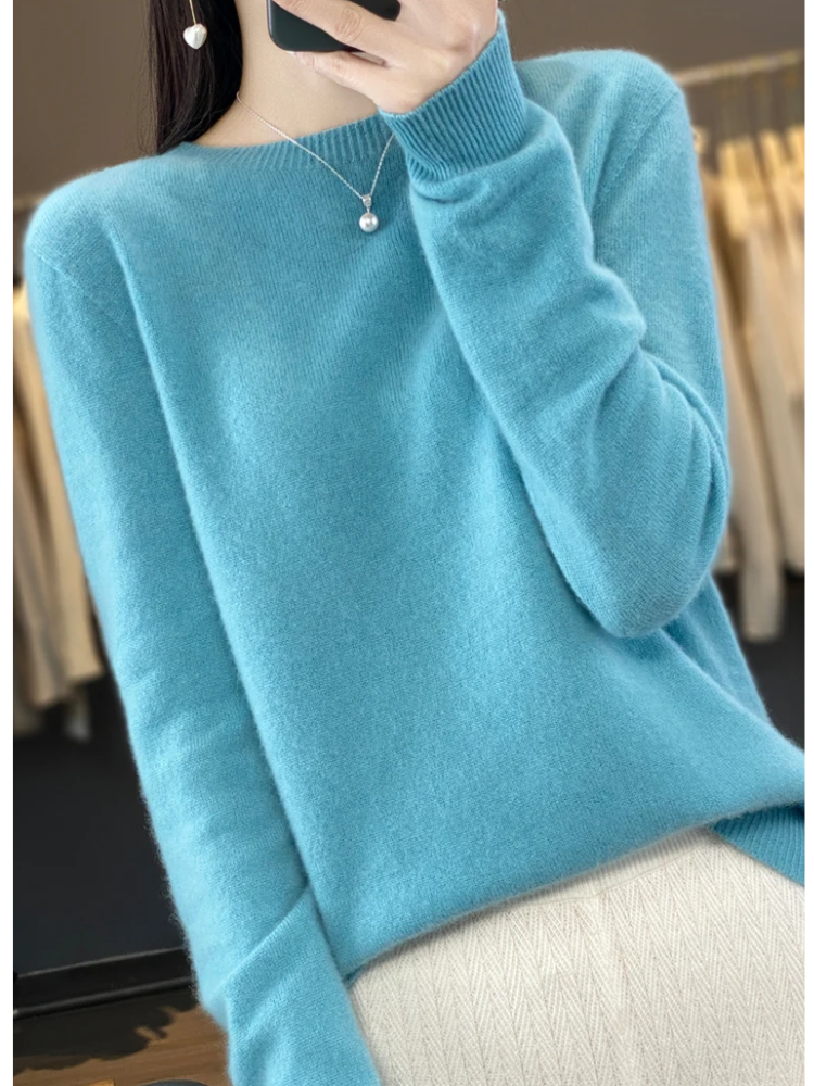 Elegant women's round neck long sleeve sweater, perfect for versatile everyday fashion and comfortable wear.