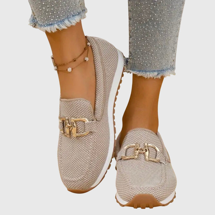 Casual women's loafers featuring a chic buckle detail, offering ultimate comfort and easy slip-on.