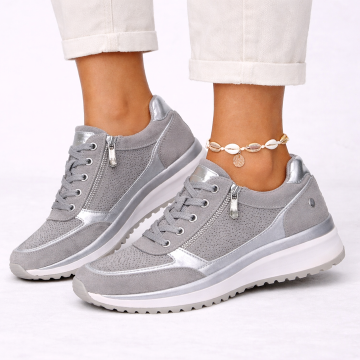 Women's everyday supportive sneakers in a neutral color, offering all-day comfort and lightweight feel for casual wear.