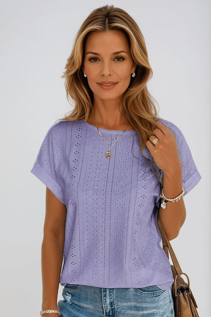 Chic women's eyelet short sleeve round neck cotton top, a comfortable and stylish choice for summer outfits.