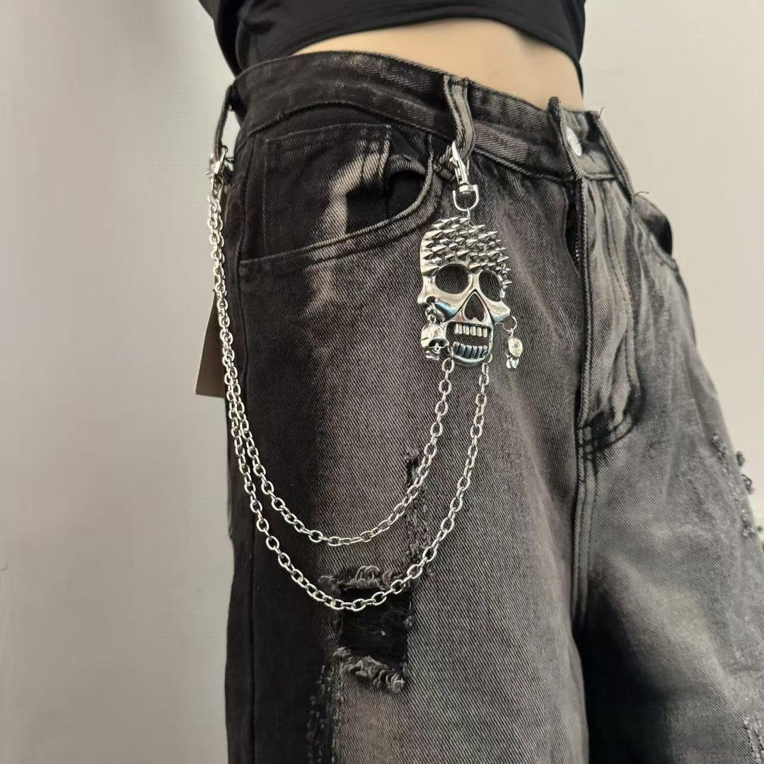 Trendy metal chain belt featuring multiple cross pendants, a chic women's fashion accessory.